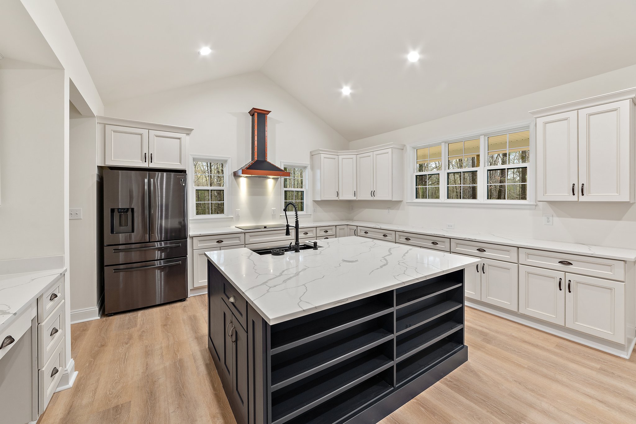 Caliber Home Builder, Ashwood II kitchen with island and lots of storage space