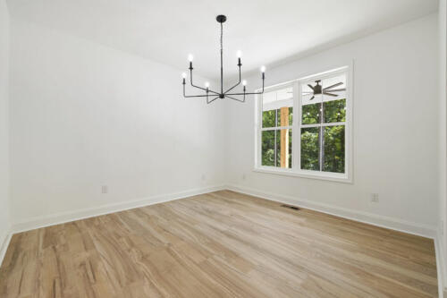 The Corbisiero - elegant farm style home - dining room with hardwood floors, by Caliber Homebuilder