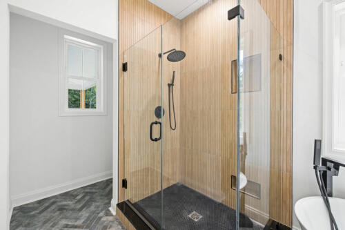 The Corbisiero - elegant full bathroom - close-up of walk-in shower, by Caliber Homebuilder