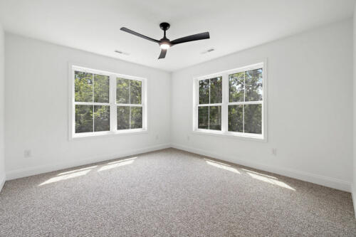 The Corbisiero - second floor bedroom with carpet floor, by Caliber Homebuilder