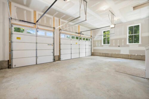 The Corbisiero - two car garage with separate doors, by Caliber Homebuilder