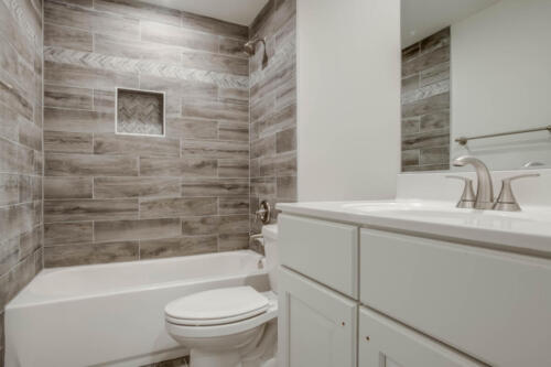 Caliber Home Builder, Hickory Shower and Toilet