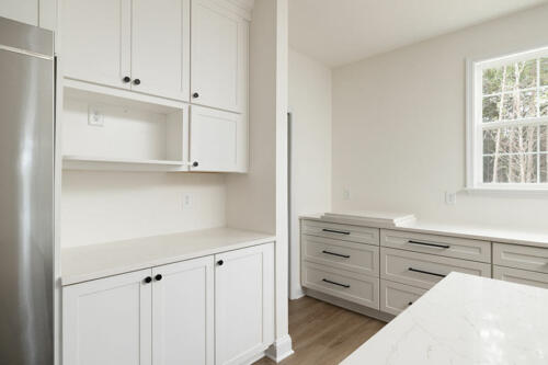 Caliber Home Builder, The Hart, Kitchen cabinets and drawers for lots of storage space
