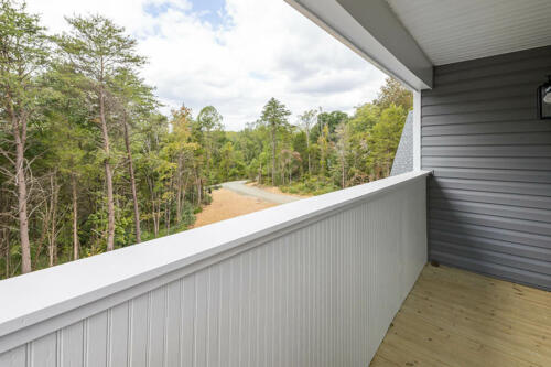 Caliber Home Builder, The Hart, upstairs balcony with a beautiful view